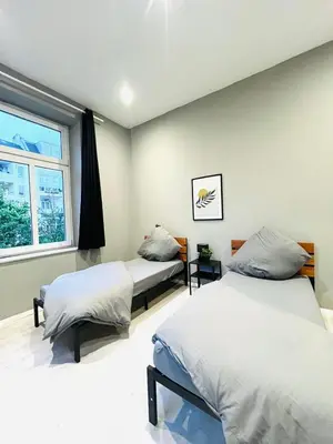 Ein Bett oder Betten in einem Zimmer der Unterkunft City Wohnung Dortmund Zentral 89-9