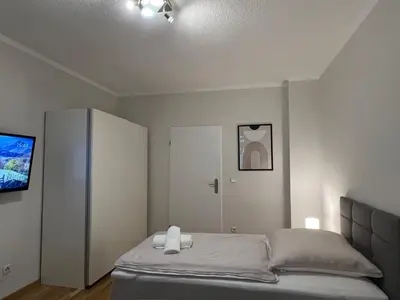 Ein Bett oder Betten in einem Zimmer der Unterkunft Ruhrperle Apartment 2 Essen