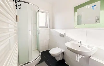Ein Badezimmer in der Unterkunft BEGE APARTMENTS TeamLodge