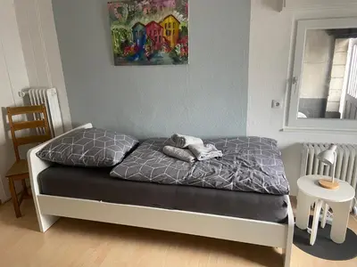Ein Bett oder Betten in einem Zimmer der Unterkunft Ferienwohnung Monteurwohnung