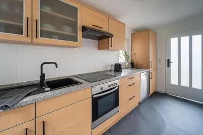 Küche/Küchenzeile in der Unterkunft Modernes Wohlfühl-Apartment