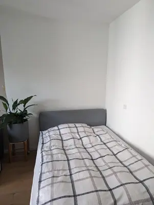 Ein Bett oder Betten in einem Zimmer der Unterkunft Helle 2 Zimmer mit Home Office