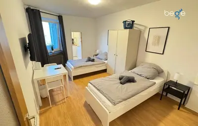 Ein Bett oder Betten in einem Zimmer der Unterkunft BEGE APARTMENTS Business Studio