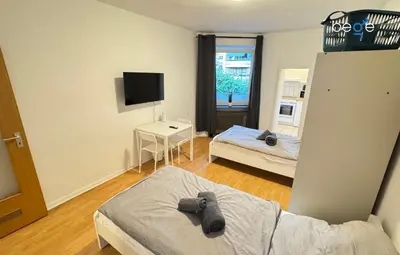 Ein Bett oder Betten in einem Zimmer der Unterkunft BEGE APARTMENTS Business Studio