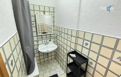 Ein Badezimmer in der Unterkunft BEGE APARTMENTS Business Studio