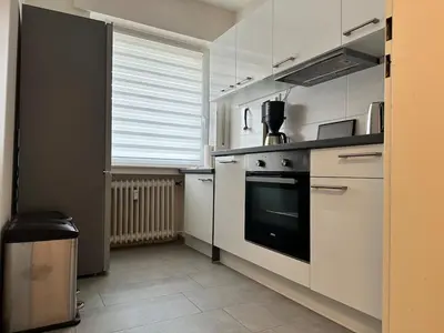 Küche/Küchenzeile in der Unterkunft Schöne 2 Zimmer Wohnung, modern & stadtnah