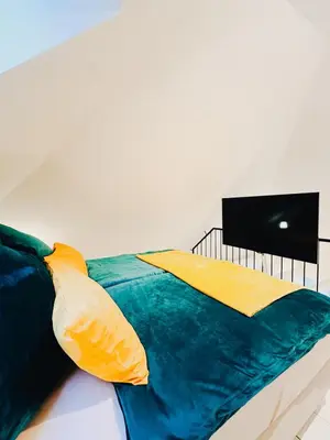 Ein Bett oder Betten in einem Zimmer der Unterkunft Art Loft in old factory