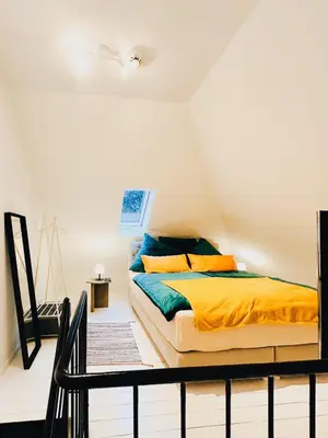 Ein Bett oder Betten in einem Zimmer der Unterkunft Art Loft in old factory