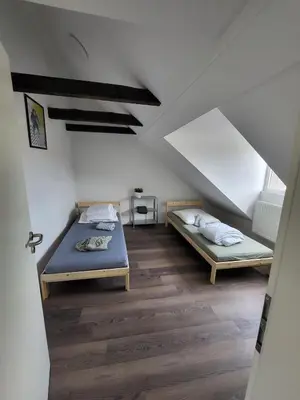 Ein Bett oder Betten in einem Zimmer der Unterkunft Am Rhein im Ruhrgebiet
