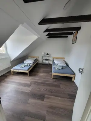 Ein Bett oder Betten in einem Zimmer der Unterkunft Am Rhein im Ruhrgebiet