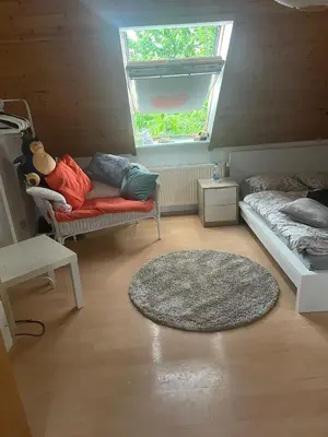 Ein Sitzbereich in der Unterkunft Zentral im Grünen