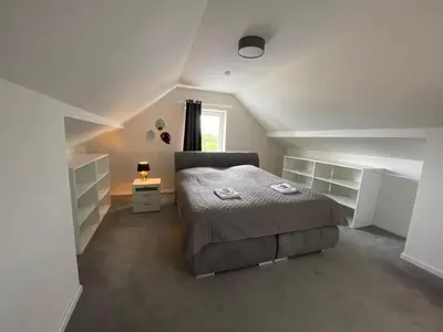 Ein Bett oder Betten in einem Zimmer der Unterkunft LivingSpace Messe Essen