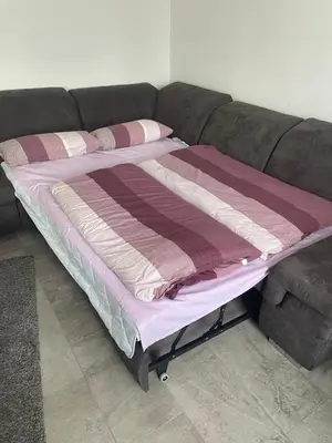 Ein Bett oder Betten in einem Zimmer der Unterkunft Schönes Appartement in der Nähe vom Schloss Herten