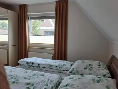 Ein Bett oder Betten in einem Zimmer der Unterkunft FeWo21 Ferienwohnung im schönen Münsterland