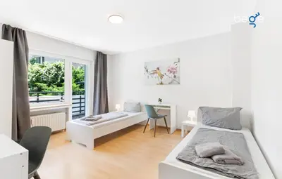 Ein Bett oder Betten in einem Zimmer der Unterkunft BEGE APARTMENTS Work Zen