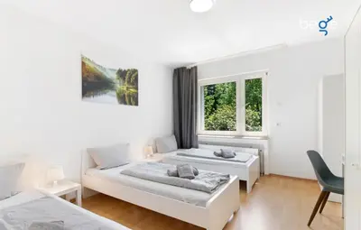 Ein Bett oder Betten in einem Zimmer der Unterkunft BEGE APARTMENTS Work Zen