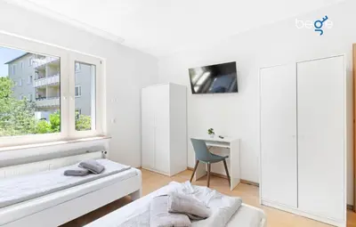 Ein Bett oder Betten in einem Zimmer der Unterkunft BEGE APARTMENTS Work Zen