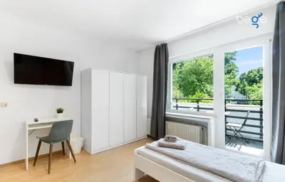 Ein Bett oder Betten in einem Zimmer der Unterkunft BEGE APARTMENTS Work Zen