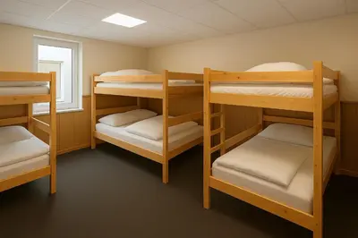 Ein Bett oder Betten in einem Zimmer der Unterkunft Artur Hotel