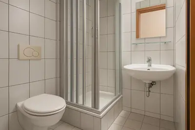 Ein Badezimmer in der Unterkunft Artur Hotel