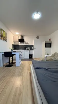 Küche/Küchenzeile in der Unterkunft Modernes City Apartment mit Parkplatz