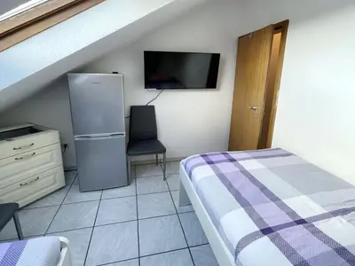Ein Bett oder Betten in einem Zimmer der Unterkunft Modern and Central Apartment in Duisburg