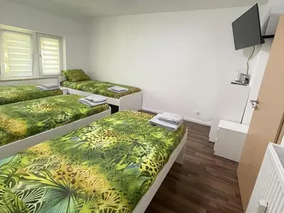 Ein Bett oder Betten in einem Zimmer der Unterkunft Central and Practical Apartment in Essen