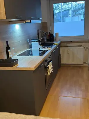 Küche/Küchenzeile in der Unterkunft Messe Essen, Modernes Apartment mit Küche, Smart-TV und separatem Schlafzimmer, Self-Check-In