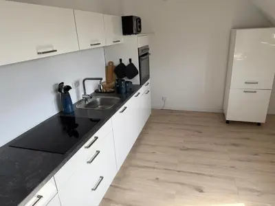 Küche/Küchenzeile in der Unterkunft Modernes Apartment Mülheim - freie Parkplätze, Smart-TV, WLAN, Nähe Messe Essen & Düsseldorf