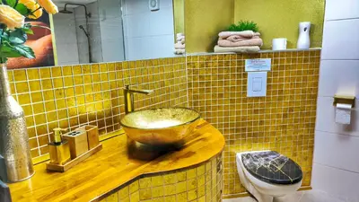 Ein Badezimmer in der Unterkunft AMORE 66 bei Greta