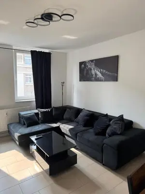 Ein Sitzbereich in der Unterkunft Modernes Apartment in Essen Nähe Messe