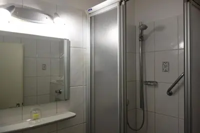 Ein Badezimmer in der Unterkunft Hotel Lex
