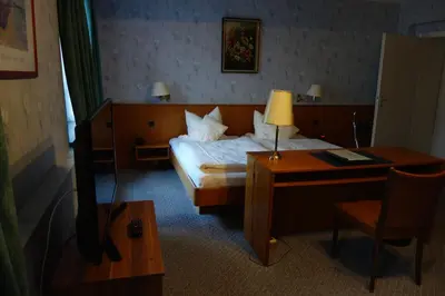 Ein Bett oder Betten in einem Zimmer der Unterkunft Hotel Lex