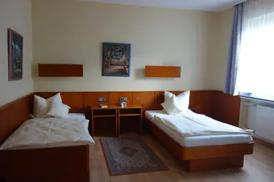 Ein Bett oder Betten in einem Zimmer der Unterkunft Hotel Lex