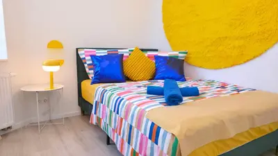 Ein Bett oder Betten in einem Zimmer der Unterkunft Blumenhof Duisburg HBF