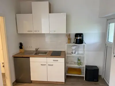 Küche/Küchenzeile in der Unterkunft Work and Sleep Hagen 3 Pers Renoviert Ruhig und modern Monteurwohnung H3