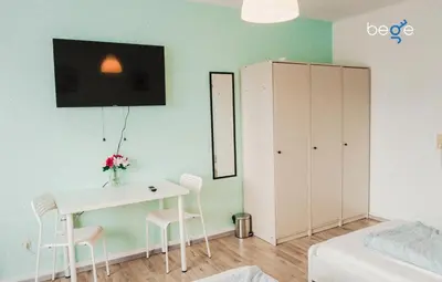 Ein Bett oder Betten in einem Zimmer der Unterkunft BEGE APARTMENTS Remote Base