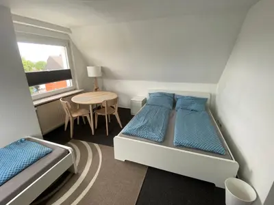 Ein Bett oder Betten in einem Zimmer der Unterkunft Work and Sleep Dortmund 3 Pers Gemütlich und zentral D3
