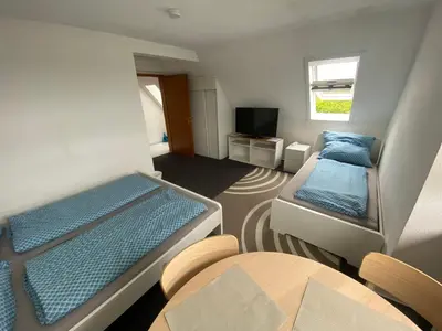 Ein Bett oder Betten in einem Zimmer der Unterkunft Work and Sleep Dortmund 3 Pers Gemütlich und zentral D3