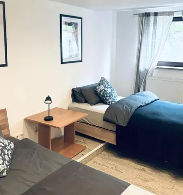 Ein Bett oder Betten in einem Zimmer der Unterkunft TulasHomeBlue