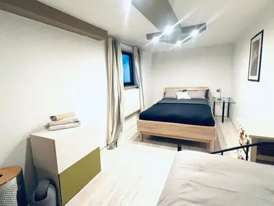 Ein Bett oder Betten in einem Zimmer der Unterkunft TulasHomeBlue