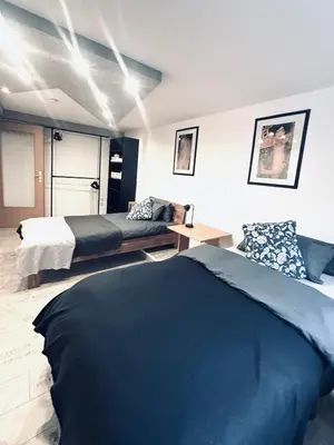 Ein Bett oder Betten in einem Zimmer der Unterkunft TulasHomeBlue