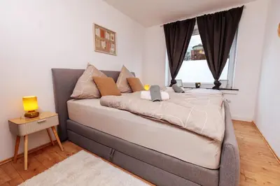 Ein Bett oder Betten in einem Zimmer der Unterkunft classic & cream - Netflix - WIFI - City - 4 Person