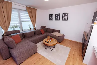 Ein Sitzbereich in der Unterkunft classic & cream - Netflix - WIFI - City - 4 Person
