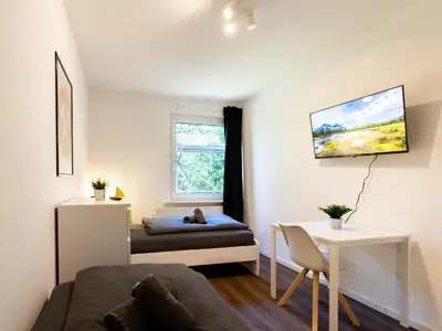 Ein Bett oder Betten in einem Zimmer der Unterkunft Nice Apartment Marl