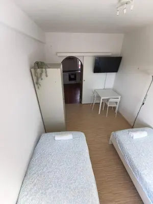 Ein Bett oder Betten in einem Zimmer der Unterkunft Working Professionals Flat