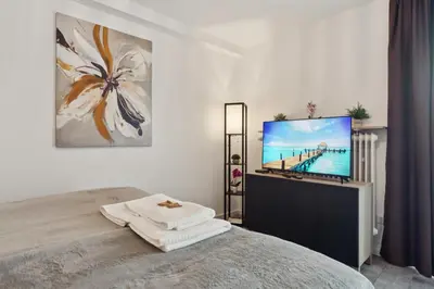 Ein Bett oder Betten in einem Zimmer der Unterkunft Schönes City Apartment Wuppertal