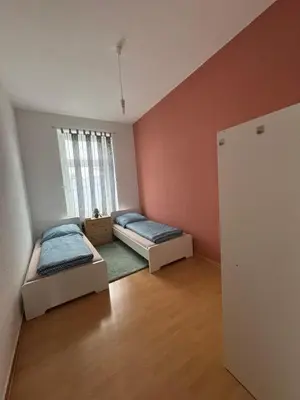 Ein Bett oder Betten in einem Zimmer der Unterkunft Kings Appartement
