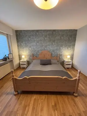 Ein Bett oder Betten in einem Zimmer der Unterkunft Fewo trallafitti