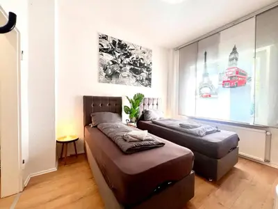 Ein Bett oder Betten in einem Zimmer der Unterkunft Zentrales Apartment mit Küche und Wlan, Nähe Essen Messe und Hbf